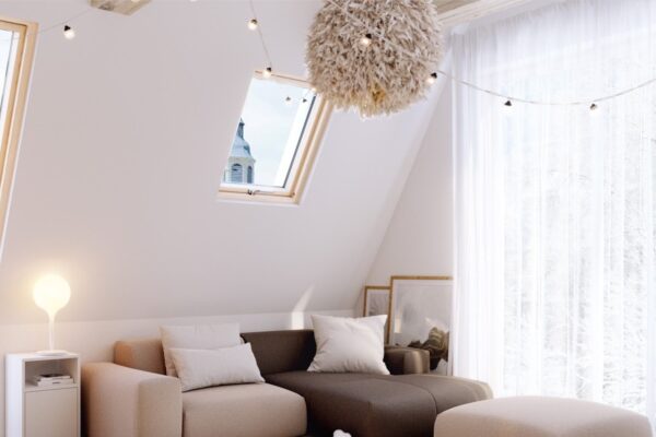 Une décoration de salon douce avec un canapé beige et marron, et un tapis blanc.