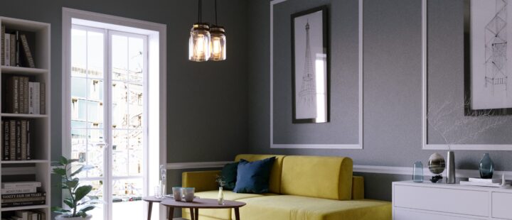 Un petit salon aménagé avec un canapé moderne jaune morderne et une petite table basse en wengé.