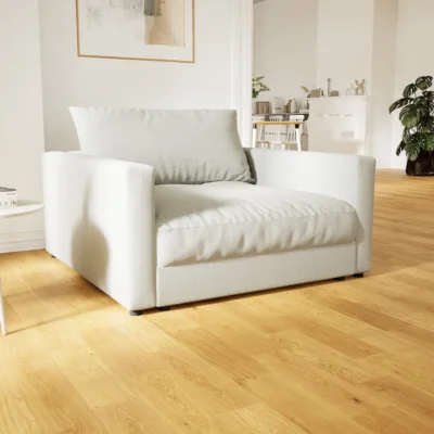 Fauteuil FLAYR en tissu fin, couleur gris clair.